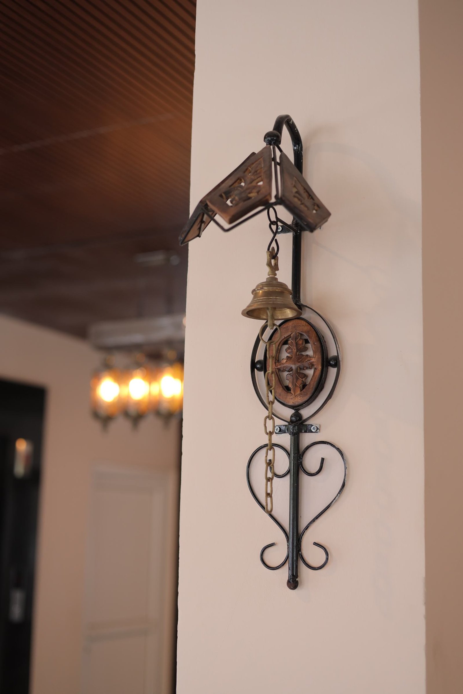 Brass bell by the entrance