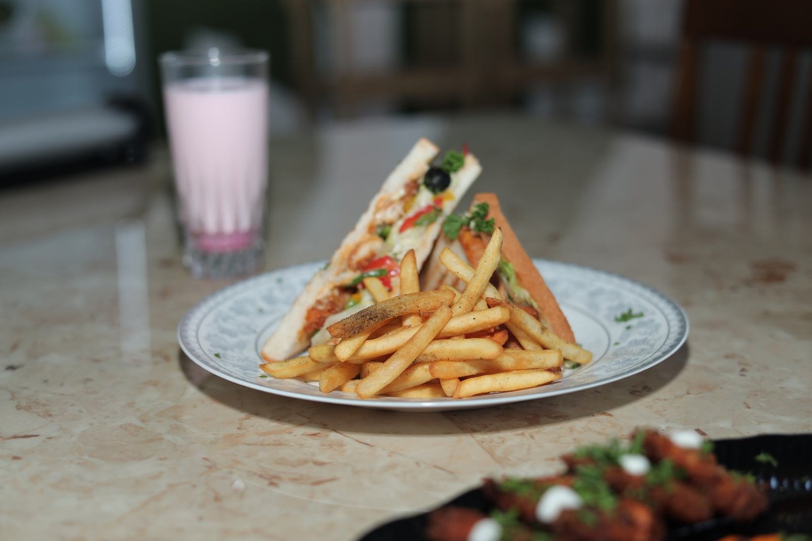 Club sandwich with fries