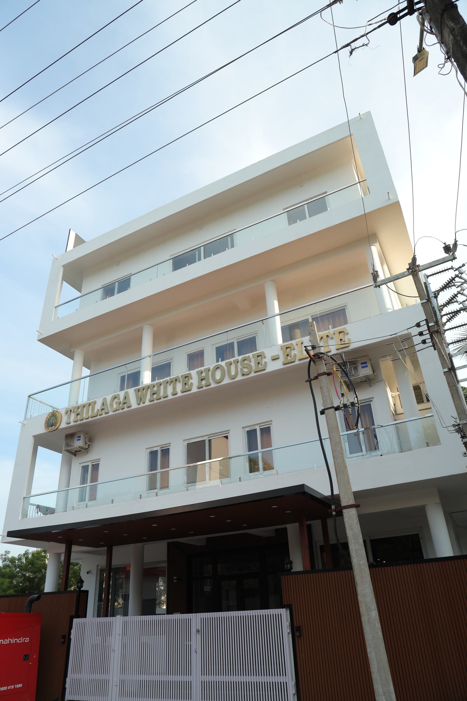 Gold lettering across the balcony