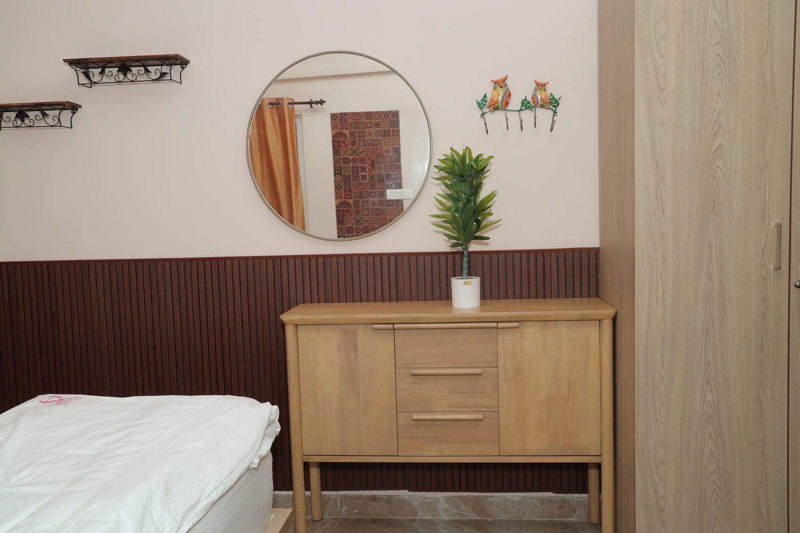 Sideboard and round mirror